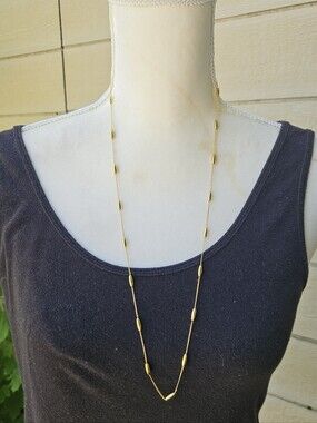 Crown Trifari gold tone station necklace